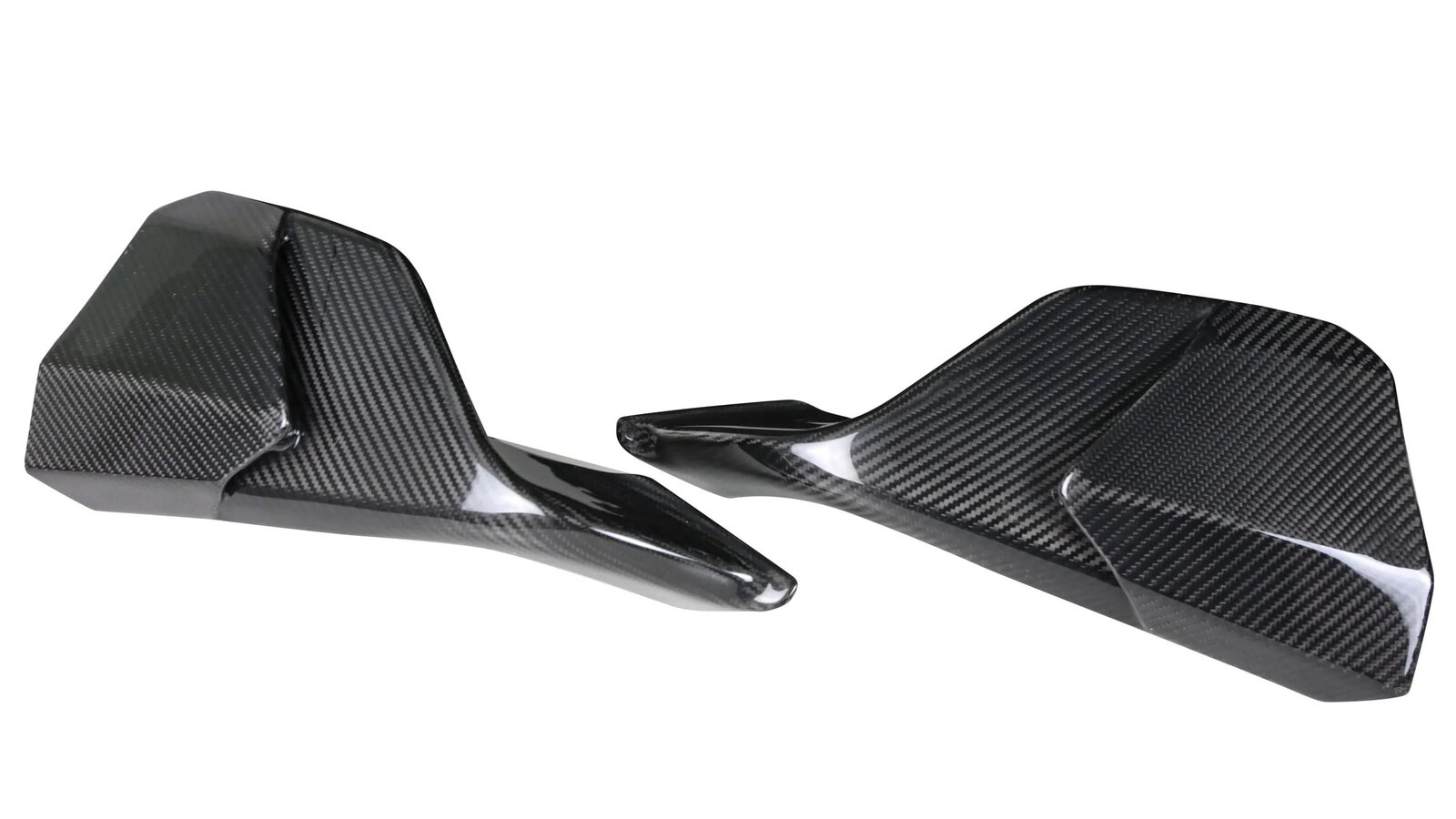Closeup of the carbon fiber side skirt installed on a blue Supra, weave clearly visible.
