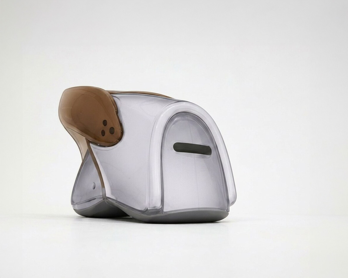 Low-angle view of the gray cicada chair at 315°, resonator slot at child eye level.